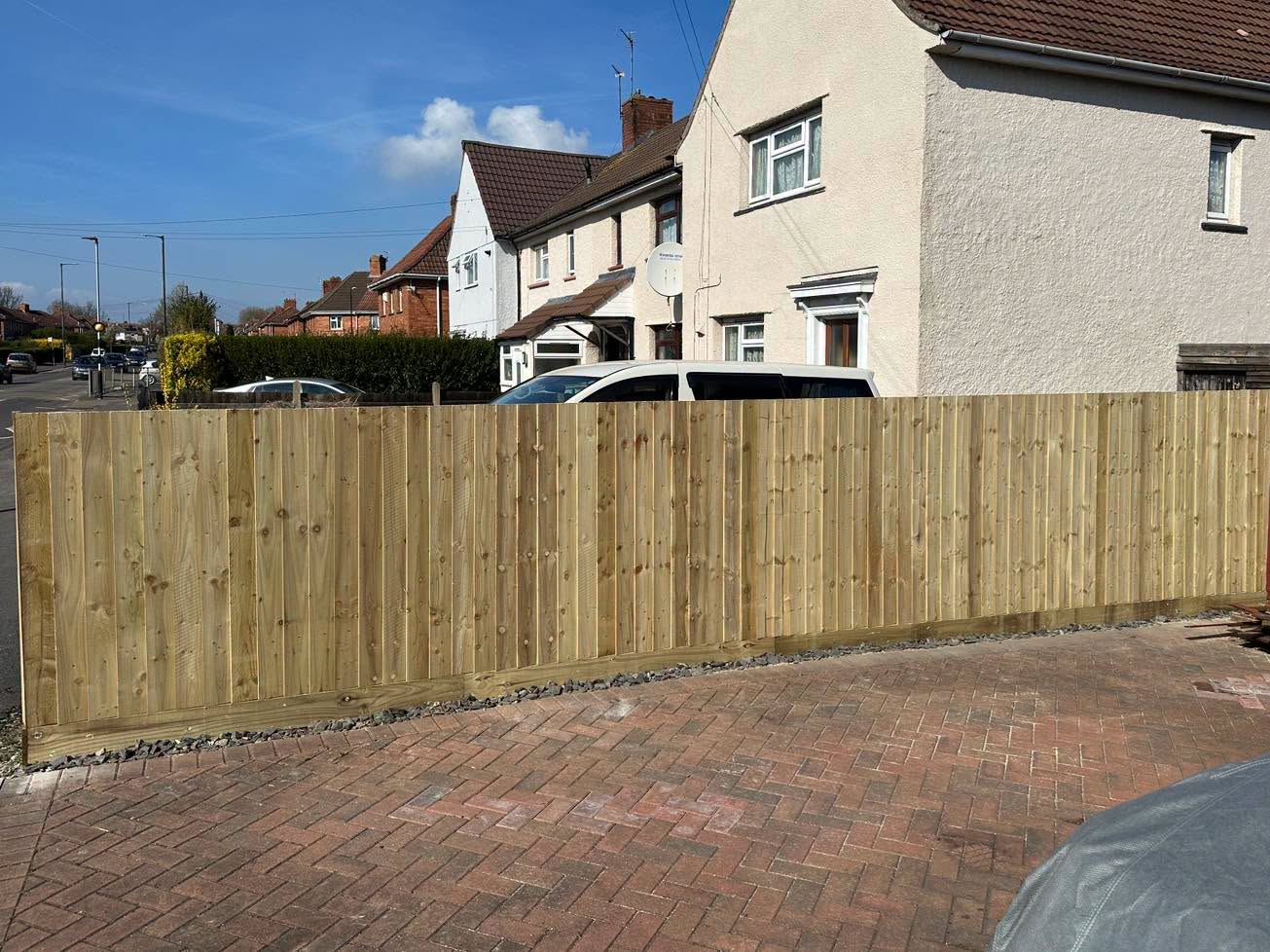 Composite fence panels in a landscaped rear garden