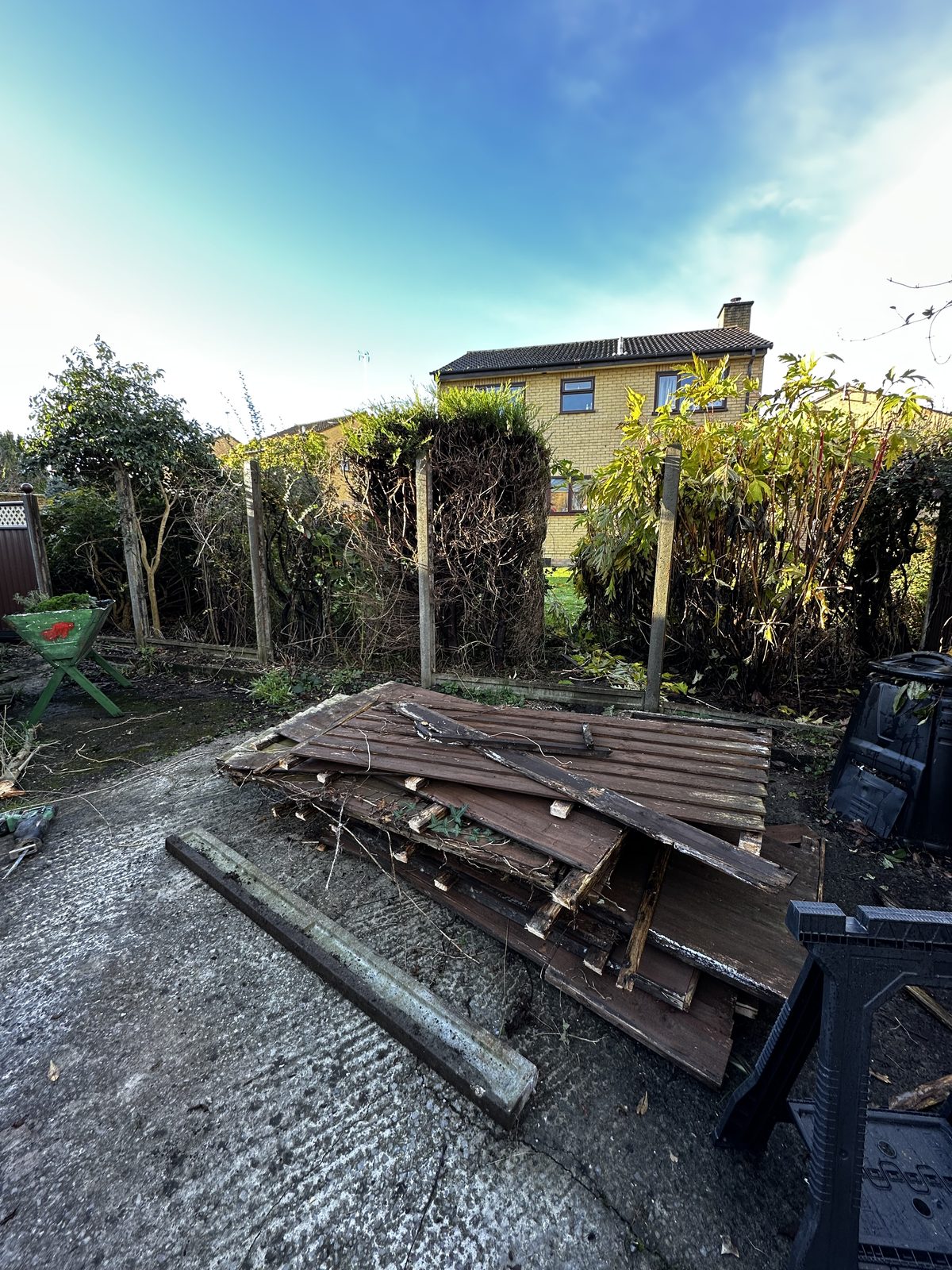 Before: a dated boundary in need of replacing