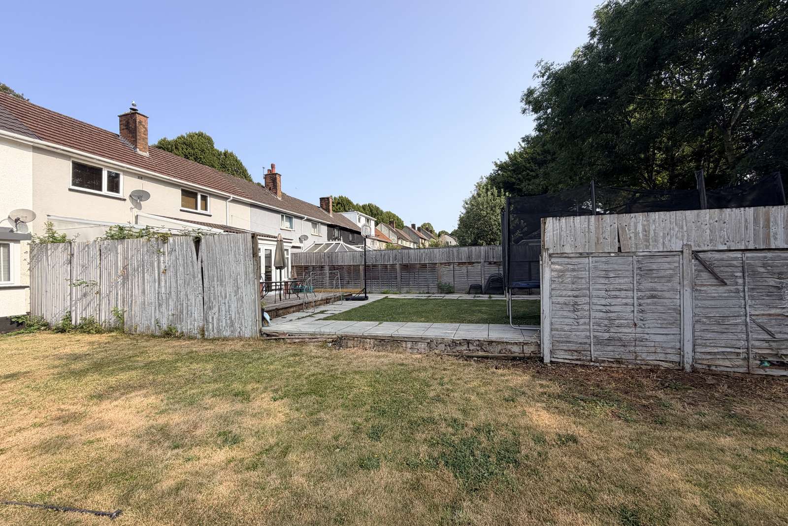 Garden boundary and surfacing before work started.