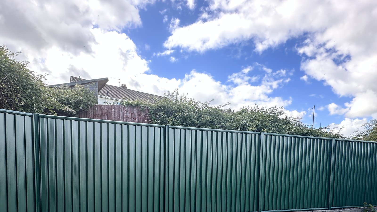 Green boundary fencing.